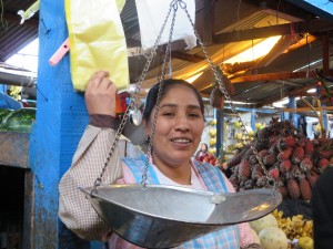 A seller at an Andes market in Peru